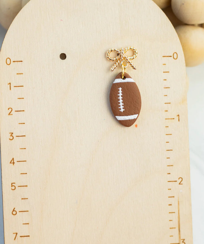 Gold Bow Football Clay Dangles