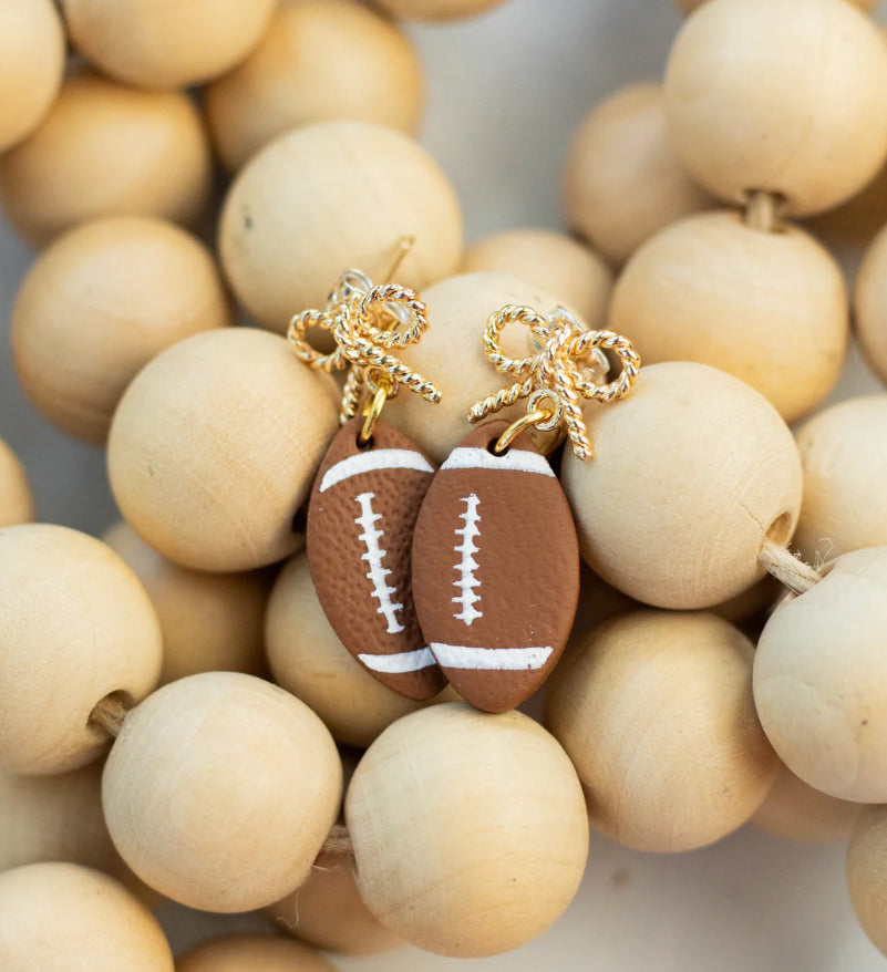 Gold Bow Football Clay Dangles
