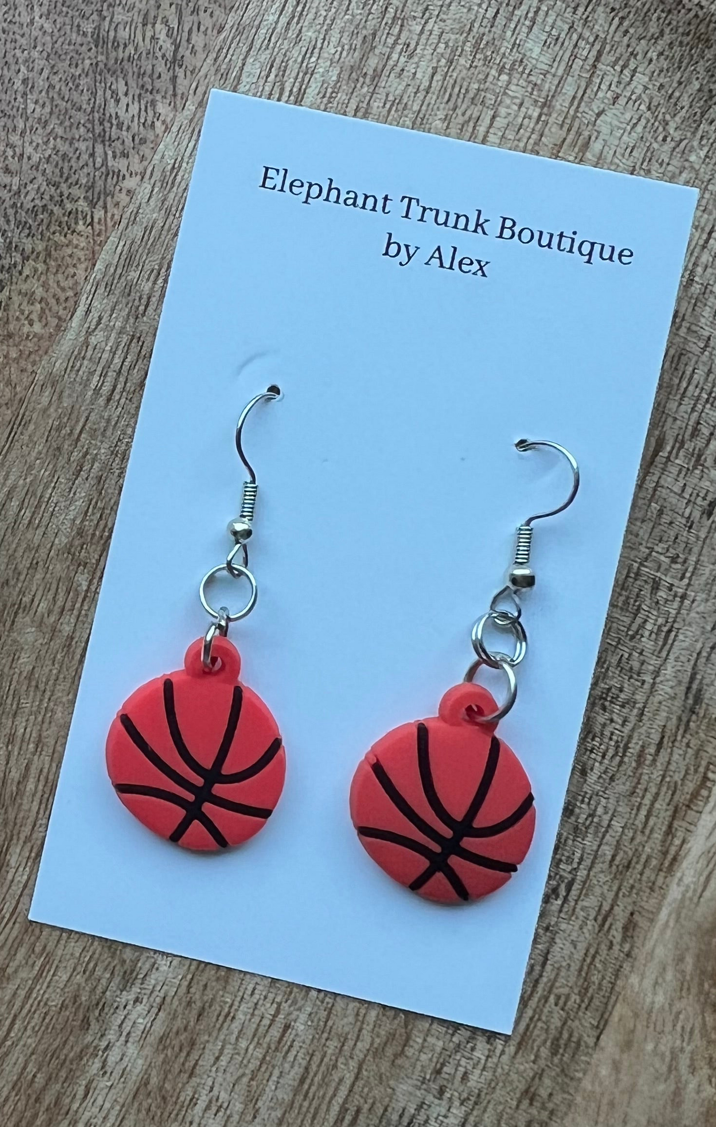 Sports dangle earrings